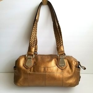Tignanelo gold leather handbag.